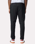 Pantalones deportivos unisex Softstyle® de peso medio con bolsillo | SF100